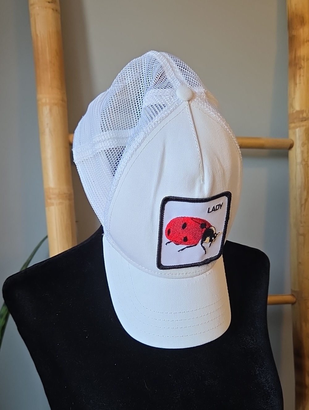 Goorin Bros White Trucker Hat with Red Ladybug Patch